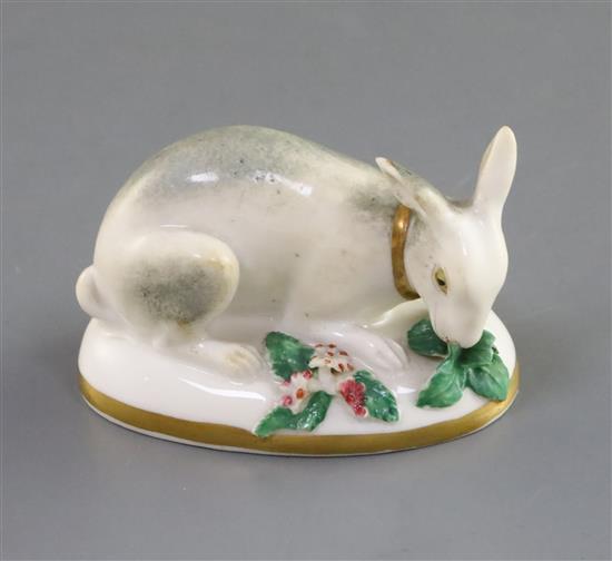 A Rockingham porcelain figure of a recumbent rabbit, c.1830, L. 7cm